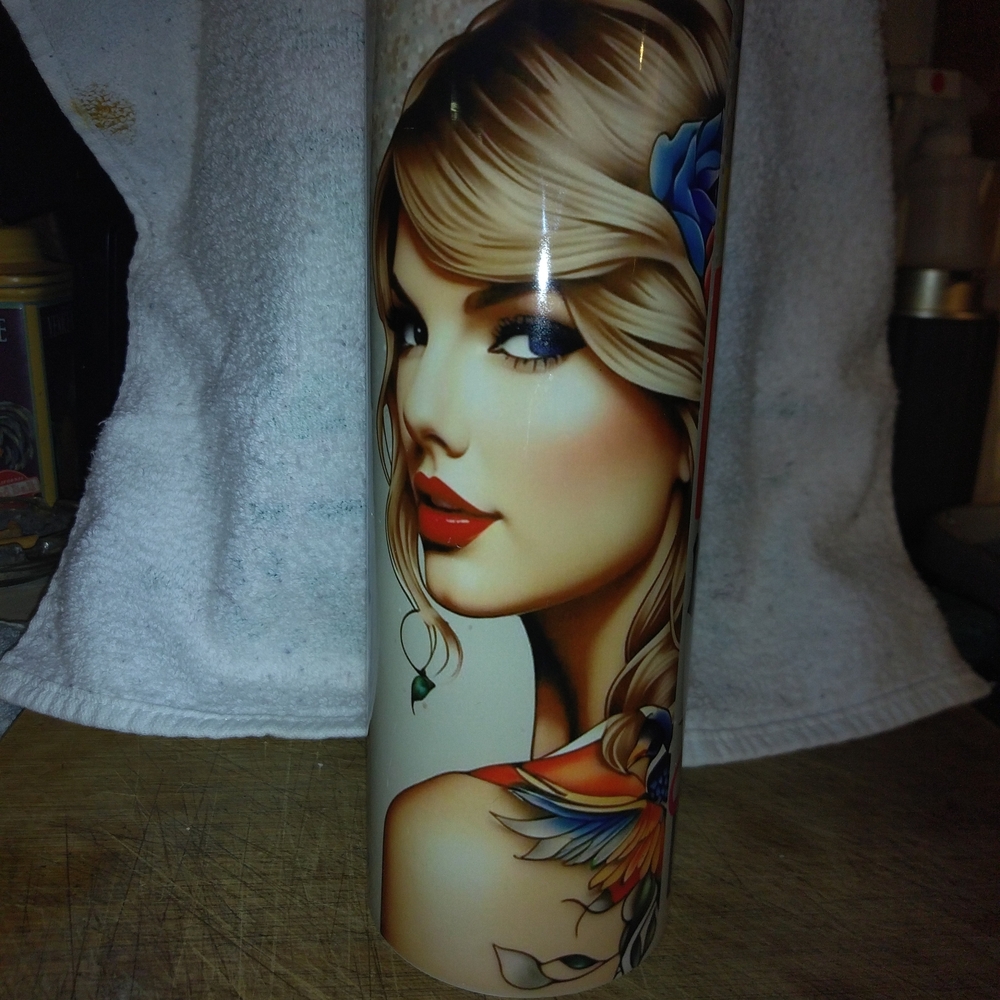 Artistic Taylor Swift Coffee Cup. Thermos Style so it's great for cold and hot.